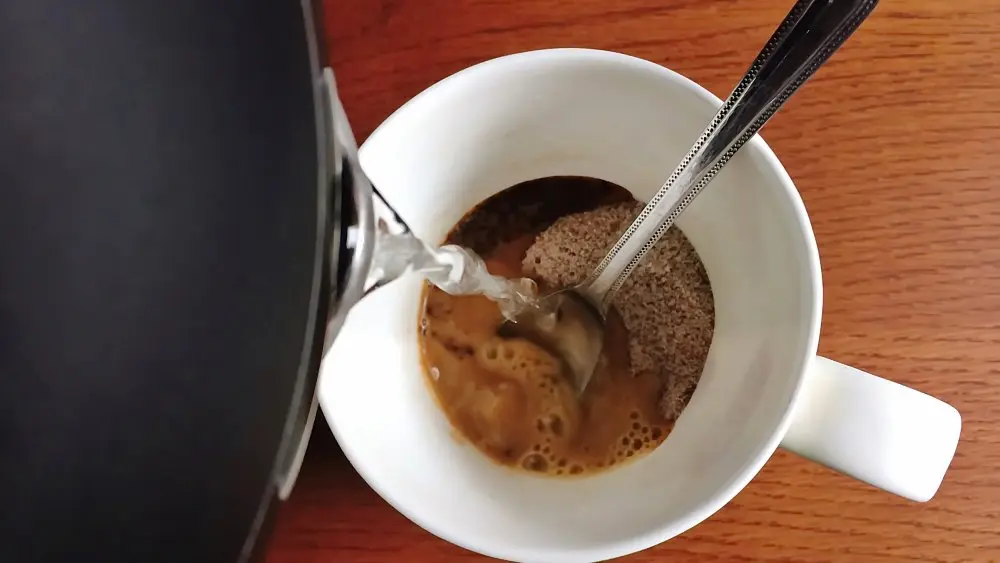 Instant coffee pouring hot water