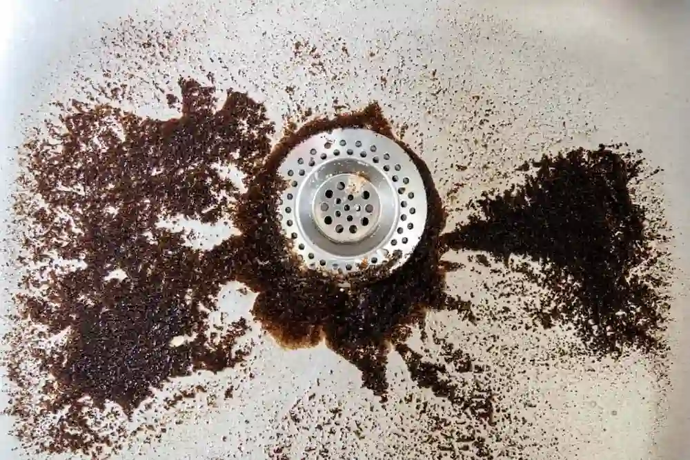 Coffee grounds going down the sink