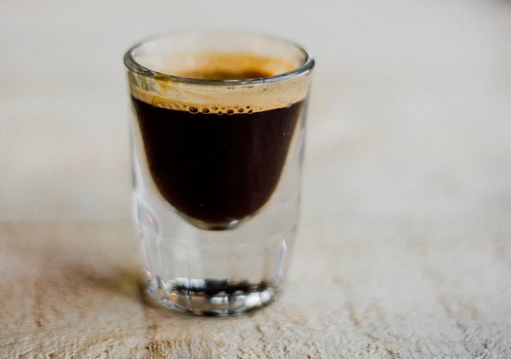 Single espresso in a small glass